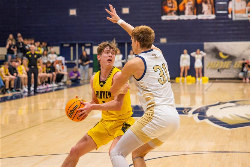 Students play basketball